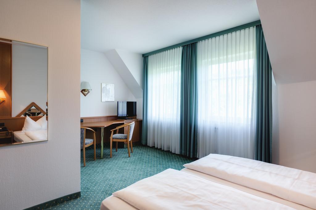 Stadthotel Muenze Бад-Мергентхайм Экстерьер фото