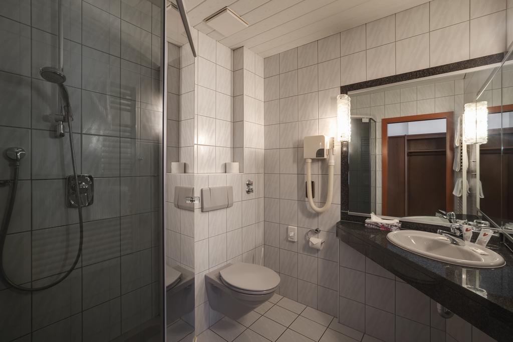 Stadthotel Muenze Бад-Мергентхайм Экстерьер фото